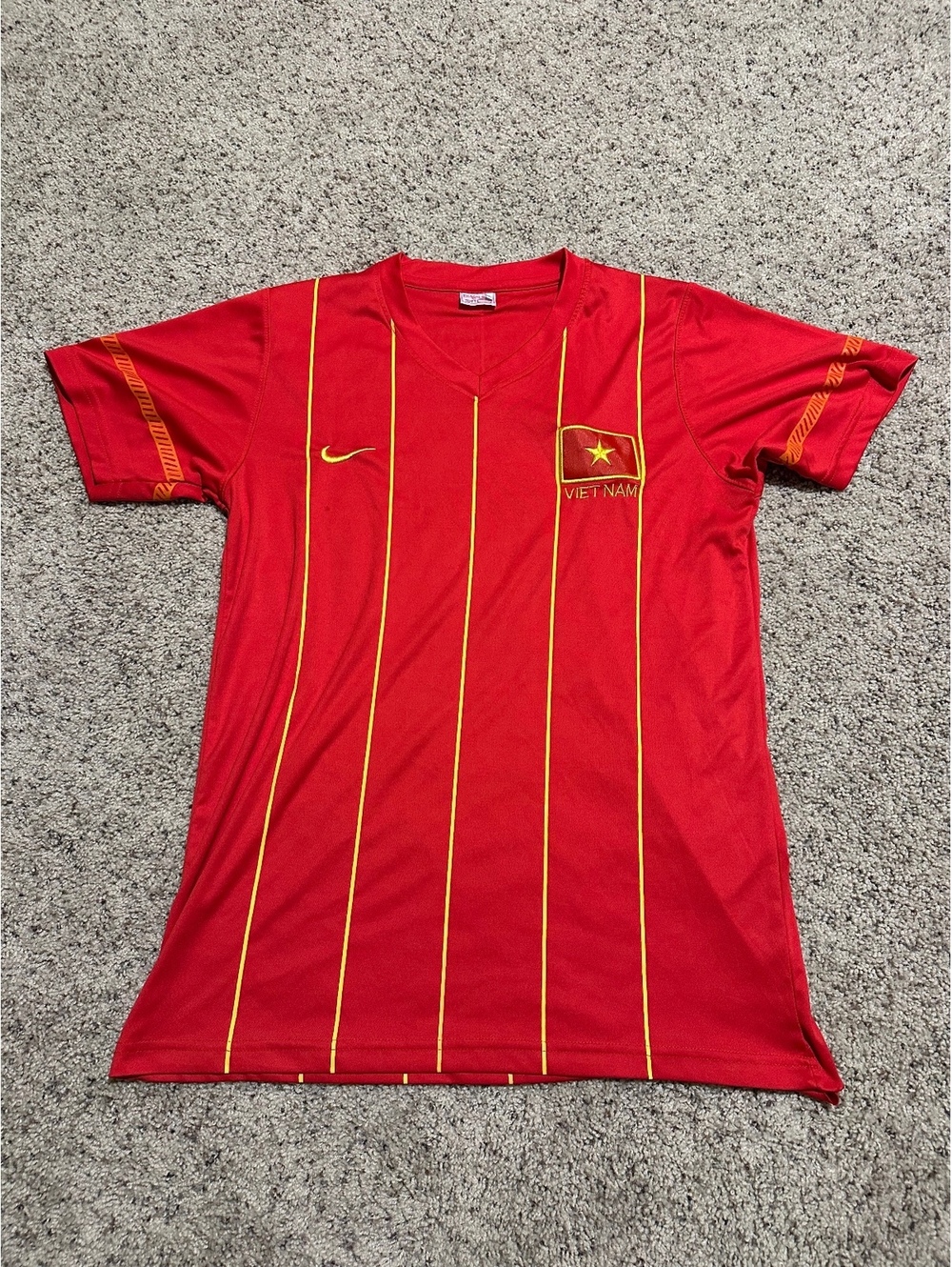 Nike Vietnam Red Soccer Jersey with Yellow Pinstripes and Embroidered Flag